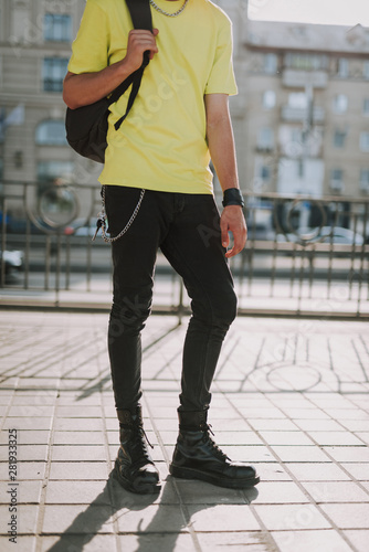 Street style man in jeans and heavy leather boots