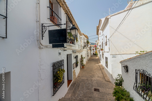 Typical street of Altea. Altea is a city in the province of Alicante known for whitewashed house-fronts that characterize the town