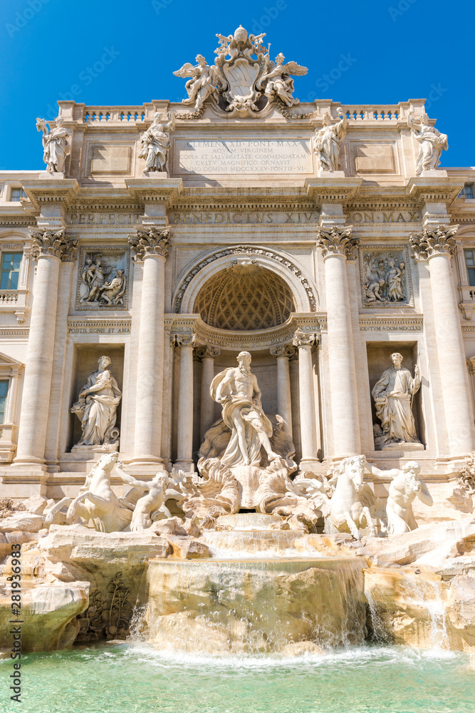 Trevi fountain (Fontana di Trevi) at sunny day, Rome, Italy. Baroque architecture. Trevi fountain is one of the main attractions of Rome city.