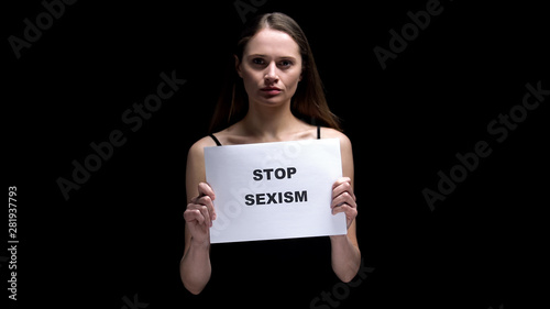 Fotografie Woman showing stop sexism sign, campaign against prejudice or discrimination