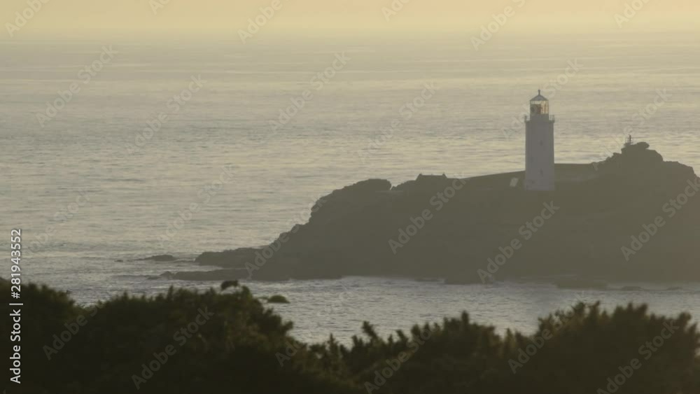 Godrevy Lighhouse, Cornwall, UK at Sunset Godrevy Lighhouse, Cornwall, UK at Sunset