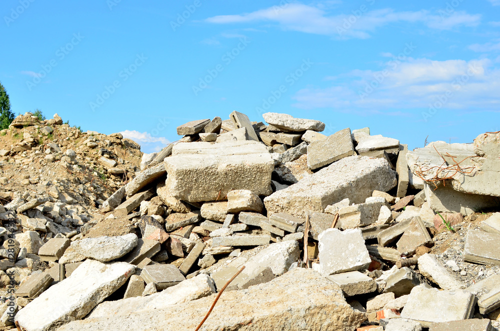 Landfill of old stones and concrete slabs from destroyed buildings.  Recycling, shredding, crusher and processing asphalt concrete, stones and  rebar shredder. Secondary crushed stone, background Stock Photo | Adobe  Stock