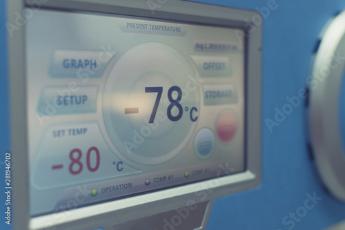 Ultra low temperature -70 degree celsius freezer for keeping specimens for laboratory testing in hospital.Front of refrigerator storage blood from patient for research in university photo