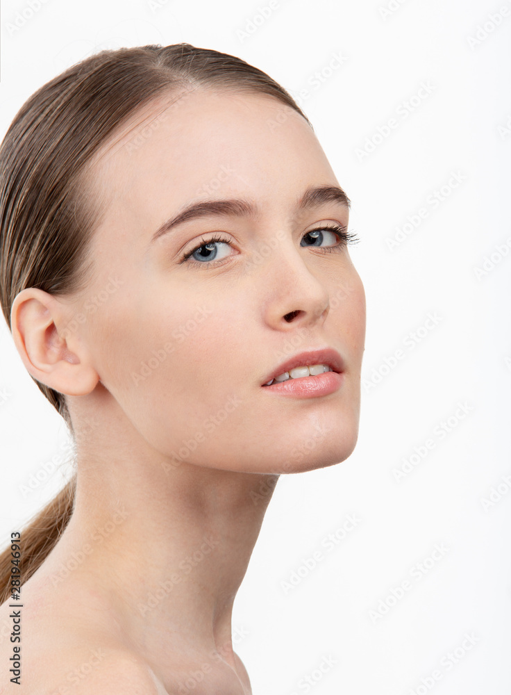 Girl without makeup, with a natural clean face, on a white isolated background Girl without makeup, with a natural clean face, on a white isolated background