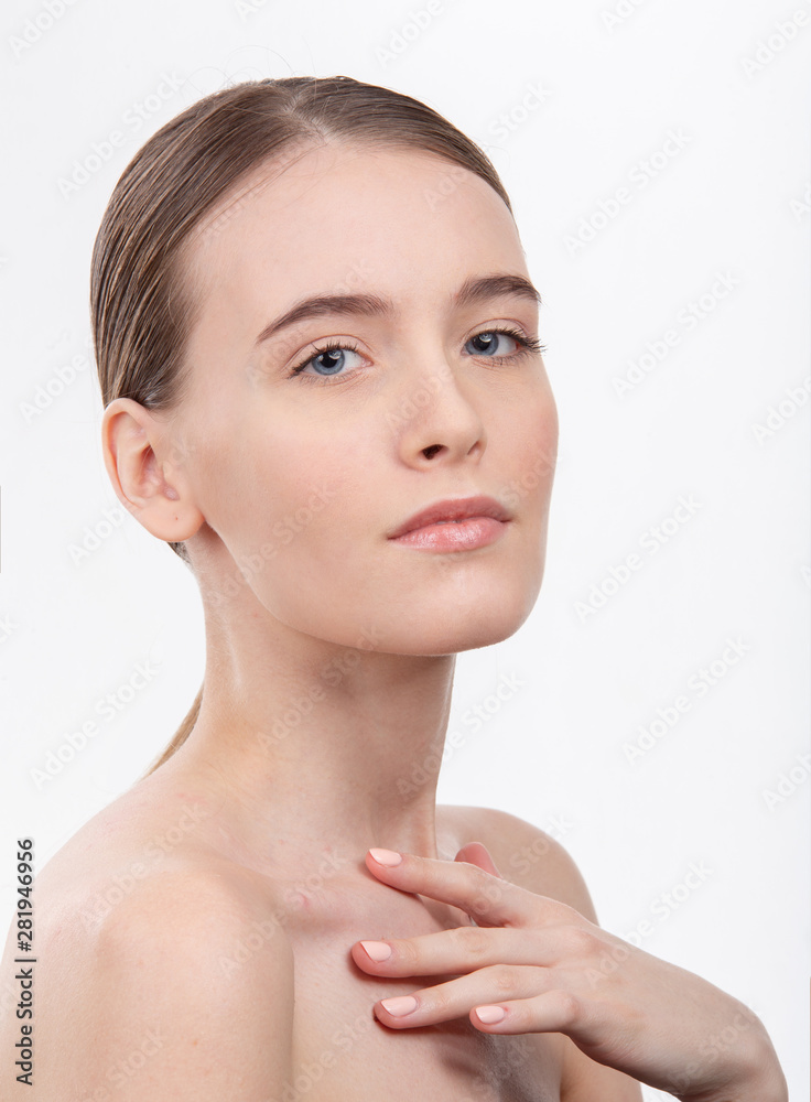 Girl without makeup, with very beautiful features, on a white isolated background