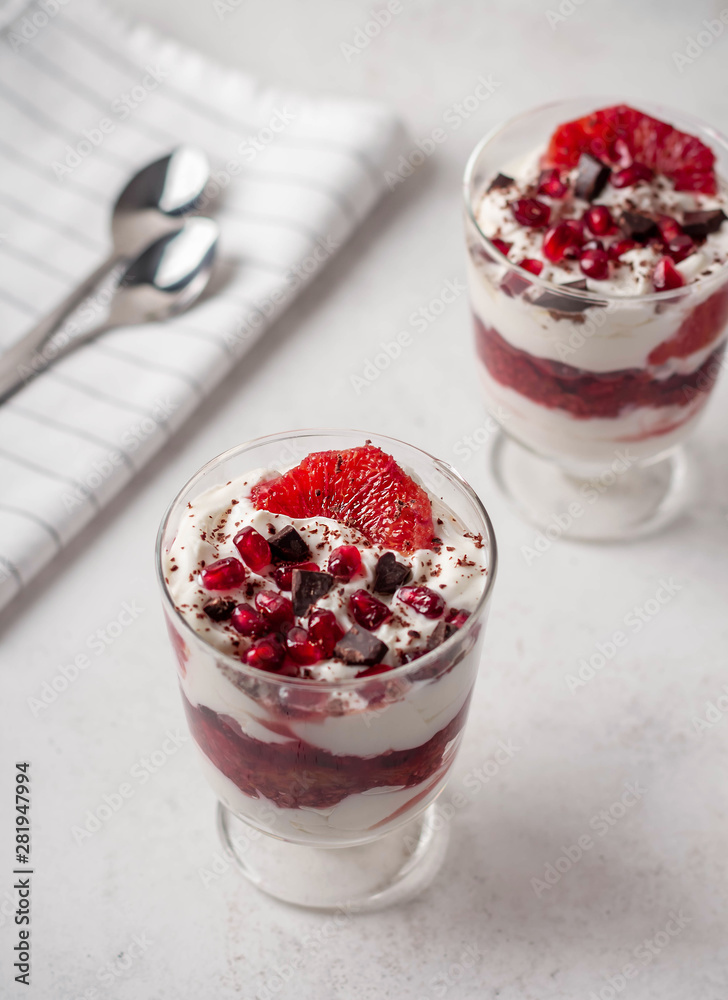 fruit dessert with bloody oranges chia yogurt in a cup on top fruit dessert with bloody oranges chia yogurt in a cup on top