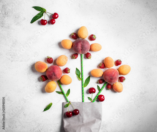 summer fruits and berries on a light background