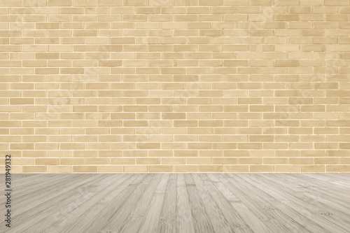 Light yellow brown brick wall with wooden floor in sepia color