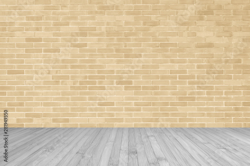 Light yellow brown brick wall with wooden floor in grey color