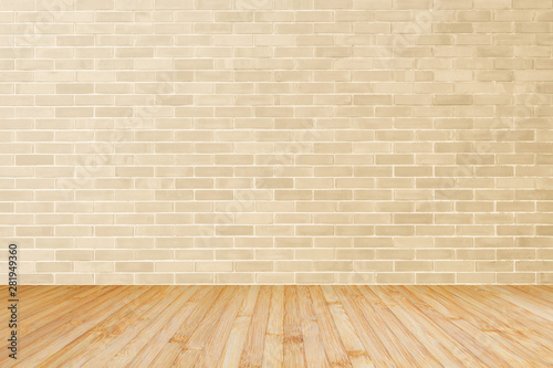 Light cream brown brick wall with wooden floor in yellow brown