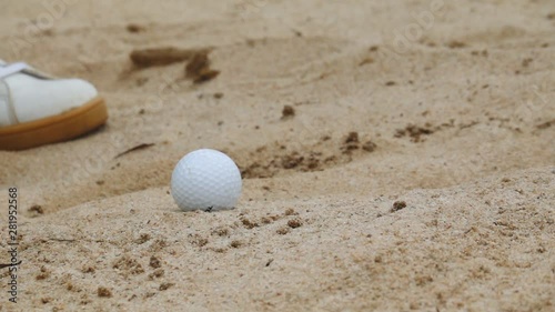 Slow Motion Hitting the golf ball out of the sand