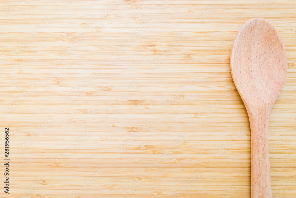 Menu background of cutting board, wooden board with kitchen ladle or spoon utensil for food preparation Menu background of cutting board, wooden board with kitchen ladle or spoon utensil for food preparation