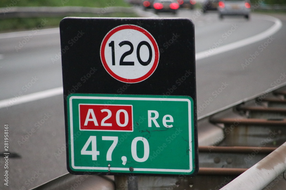 Speed and distance sign in the shoulder of motorway A20 at 47 km on right side in the Netherlands