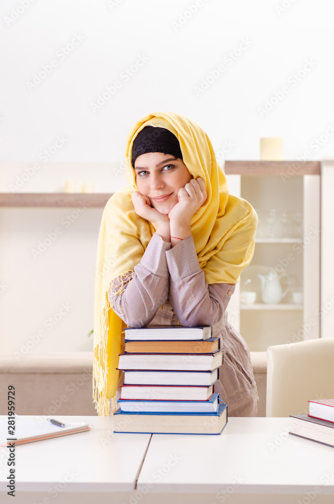 Female student in hijab preparing for exams Female student in hijab preparing for exams