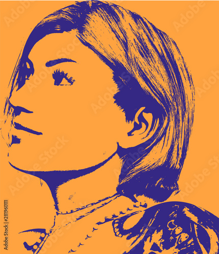 Portrait of a dreaming woman with a short haircut and a tattoo