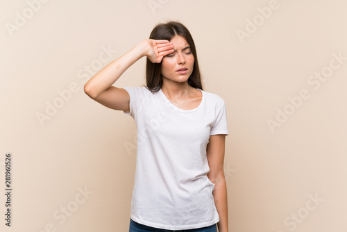 Pretty young girl over isolated background with tired and sick expression