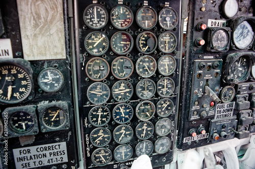 old vintage aircraft cockpit detail, pattern of multi meter gauge measure background © sky studio