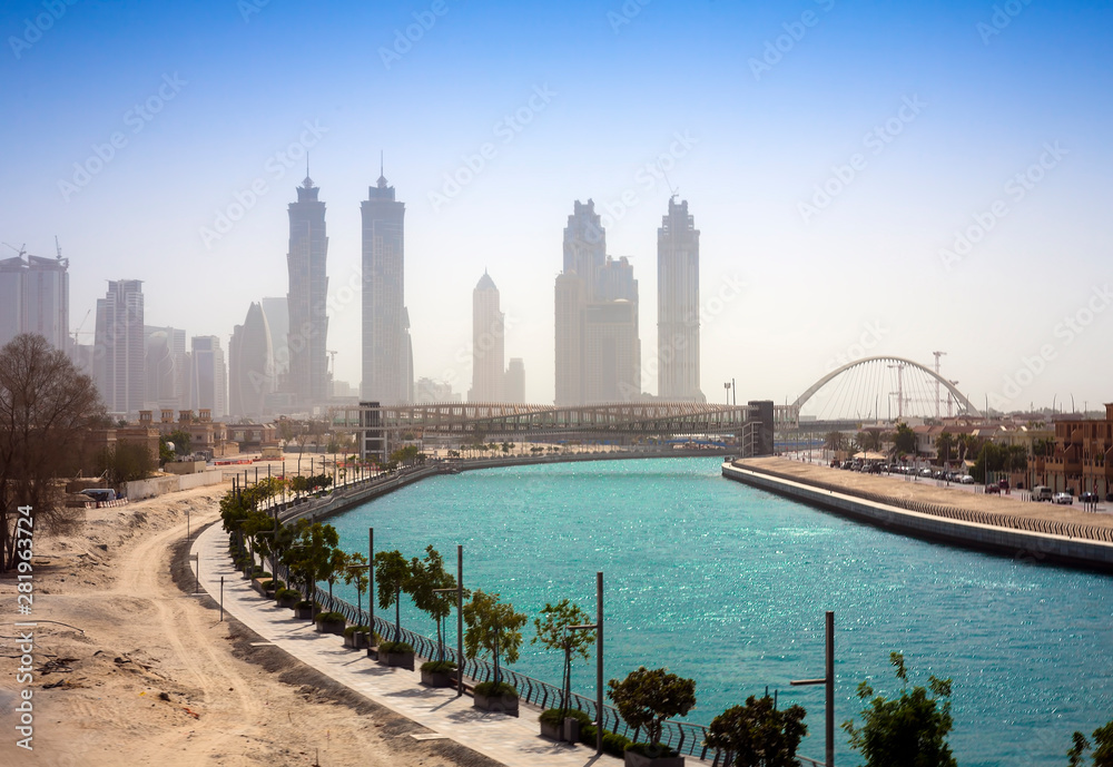 Obraz premium Dubai Creek river and Tolerance bridge. Cityscape