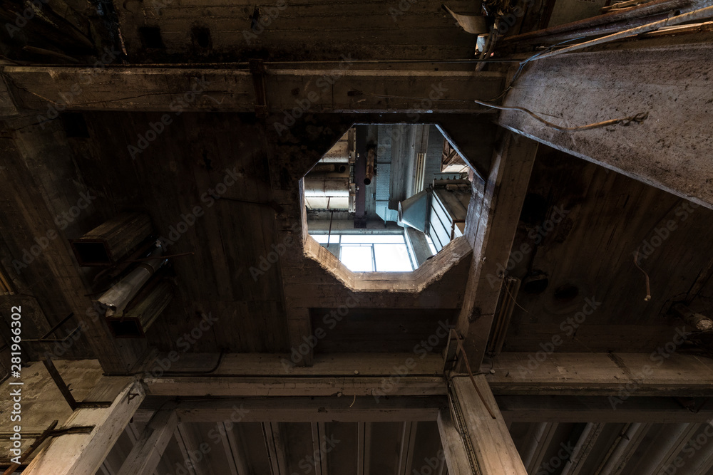 Obraz premium Urban exploration in an abandoned agroindustrial factory