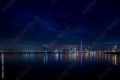 Dubai Skyline City Lights & Reflections in Water, Dubai, United Arab Emirates