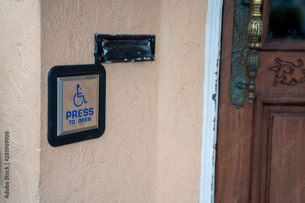 Press to open handicap button disability accessibility outside of door entrance