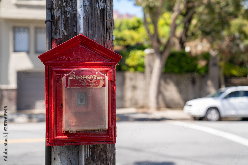 Department of electricity red fire alarm posted outside in residential neighborhood Department of electricity red fire alarm posted outside in residential neighborhood