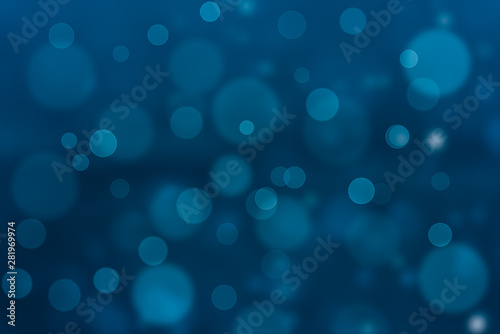 Abstract glittering blue bokeh background
