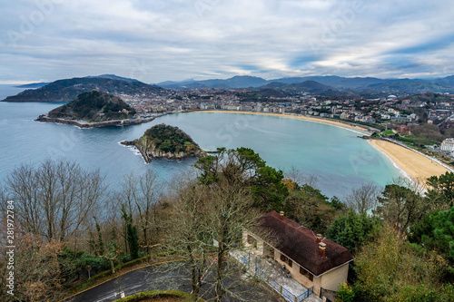 Scenic panoramic view of San Sebastian and La Concha bay in a cloudy day from Monte Igueldo, Basque Country, Spain