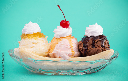 Classic Banana Split on a Bright Teal Background photo