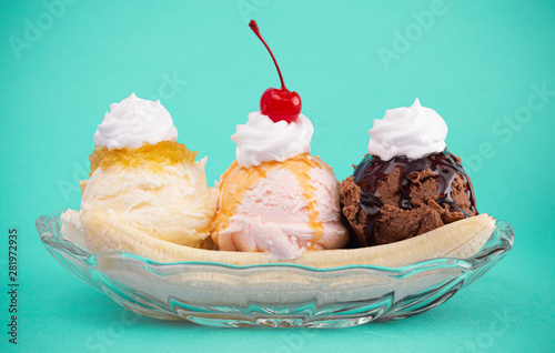 Fényképezés Classic Banana Split on a Bright Teal Background