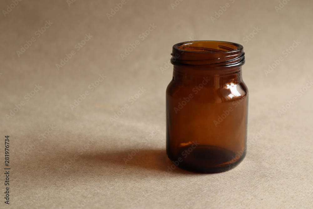 Brown Chicken Soup Soup Extract Bottle on Brown Background,mockup Brown Chicken Soup Soup Extract Bottle on Brown Background,mockup