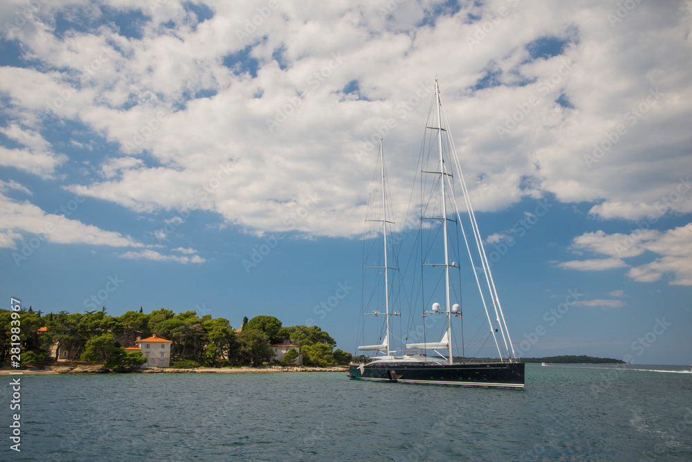 Obraz premium Holidays in Croatia, a big sailboat in Brijuni. Summer sunny day.