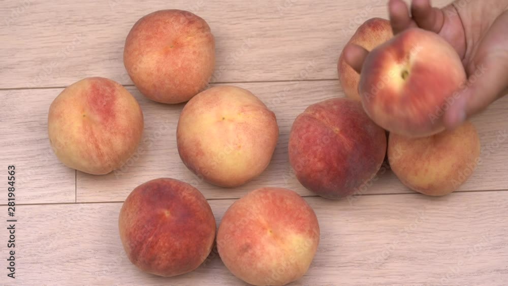 White peaches on a visible background. Alternate peach sampling White peaches on a visible background. Alternate peach sampling