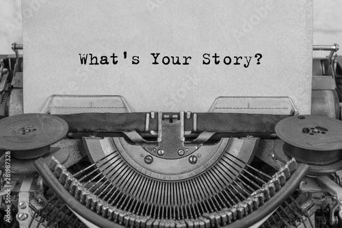 what's your story? The text is typed on paper with an old typewriter, a vintage inscription, a story of life.