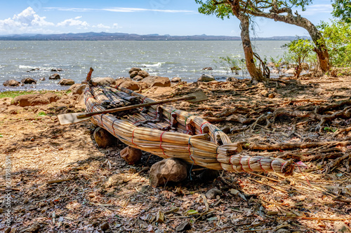 Traditional fishing papyrus boat from reed, on Lake Tana in Bahir Dar, Ethiopia photo