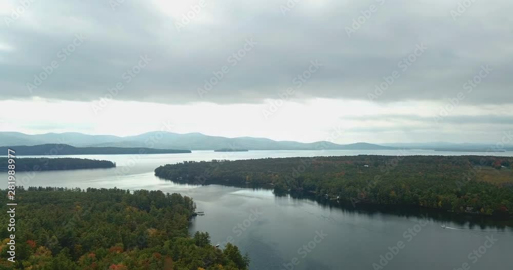 Aerial Lake in Autumn. Beautiful trees and a Boat Landscape Scenery Aerial Lake in Autumn. Beautiful trees and a Boat Landscape Scenery