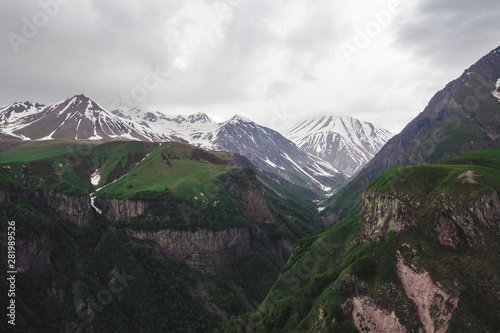 Mountains rocks landscape with cloudy dramatic sky photo