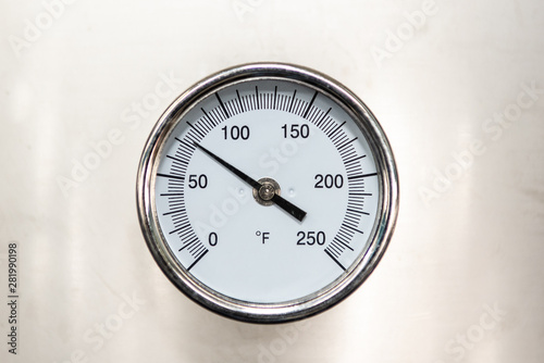 Temperature reading dial indicates that all machinery being monitored is maintaining a safe level.