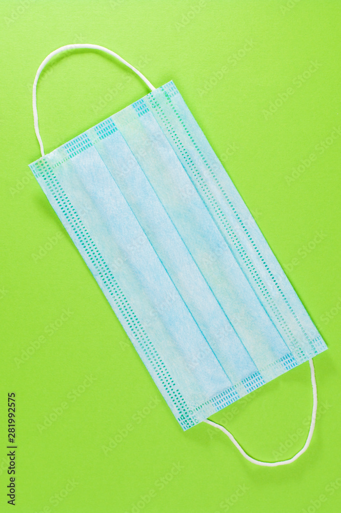 blue gauze bandage on a green background blue gauze bandage on a green background