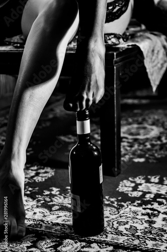 legs of sexy girl sitting on a table
