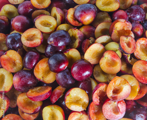 halves of ripe plum fruit photo