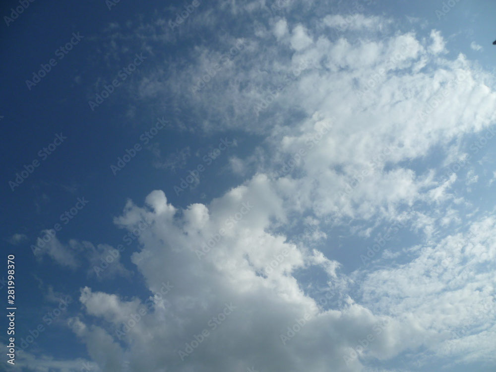 a white cloud flying along the blue sky a white cloud flying along the blue sky