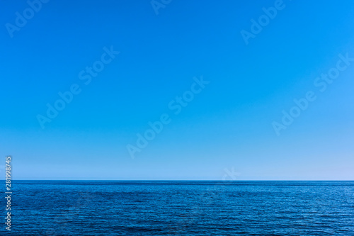 Seascape with sea horizon and blue sky © Roman Sigaev