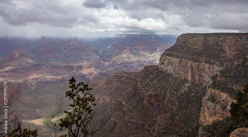 Grand Canyon, Arizona, USA. Overlook of the red rocks, cloudy sky background