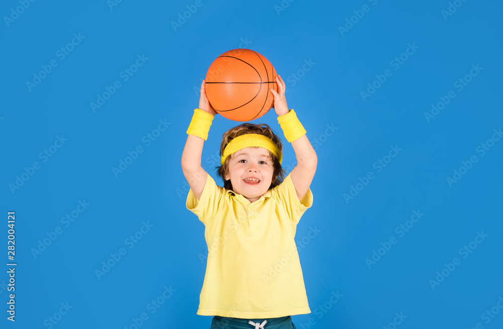 Basketball training. Cute boy playing basketball. Sport game. Kid activities. Little basketballer. Sports equipment. Active lifestyle. Sport. Basketball training. Cute boy playing basketball. Sport game. Kid activities. Little basketballer. Sports equipment. Active lifestyle. Sport.
