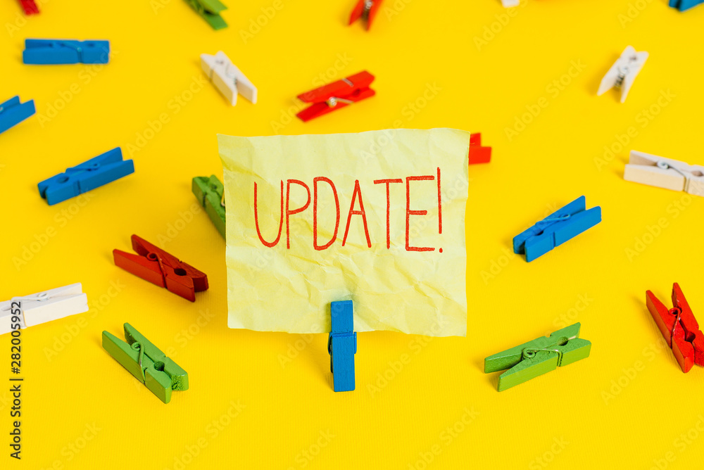 Conceptual hand writing showing UPDATE. Concept meaning make something more modern or up to date like software program Conceptual hand writing showing UPDATE. Concept meaning make something more modern or up to date like software program