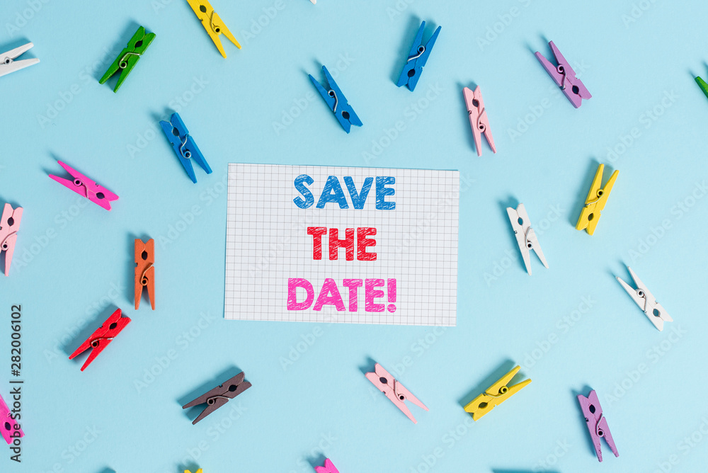 Handwriting text writing Save The Date. Conceptual photo Organizing events well make day special event organizers Colored clothespin rectangle shaped reminder paper light blue background Handwriting text writing Save The Date. Conceptual photo Organizing events well make day special event organizers Colored clothespin rectangle shaped reminder paper light blue background