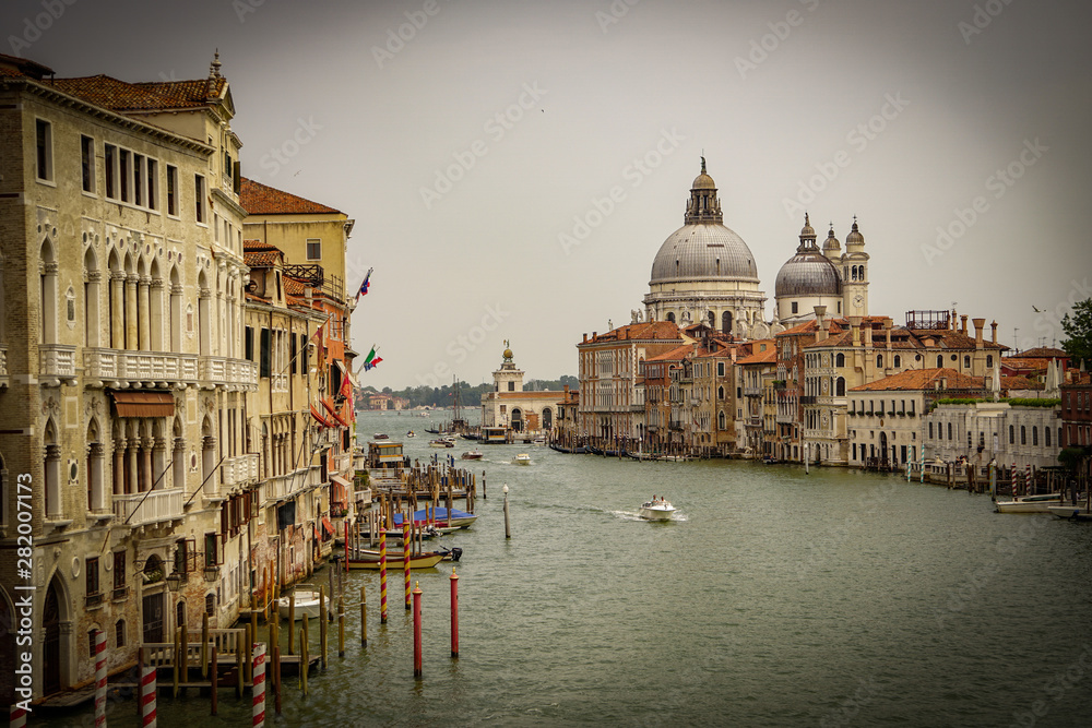 VENICE, ITALY - JULY,5: Nice day in the center of Venice, boats, buildings, bridges and channels
