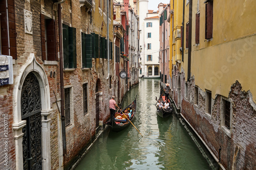 VENICE, ITALY - JULY,5: Nice day in the center of Venice, boats, buildings, bridges and channels © ekaterina McClaud