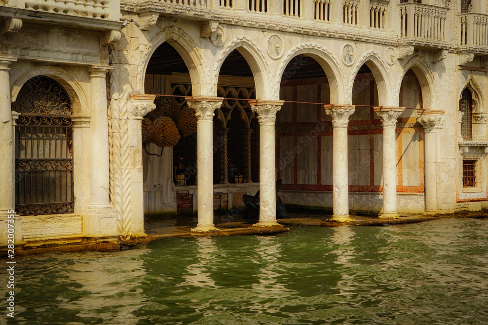 VENICE, ITALY - JULY,5: Nice day in the center of Venice, boats, buildings, bridges and channels